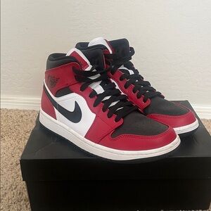 Air Jordan 1 Mid, black and red.